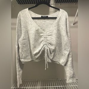 cropped oversized light-gray tie-front sweater
